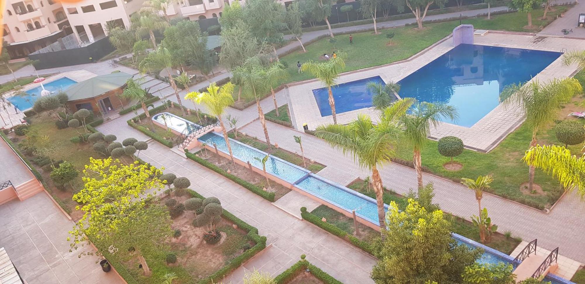 Un Moderne Chic Appartement Vue Sur Piscine Marrakesh Exteriör bild