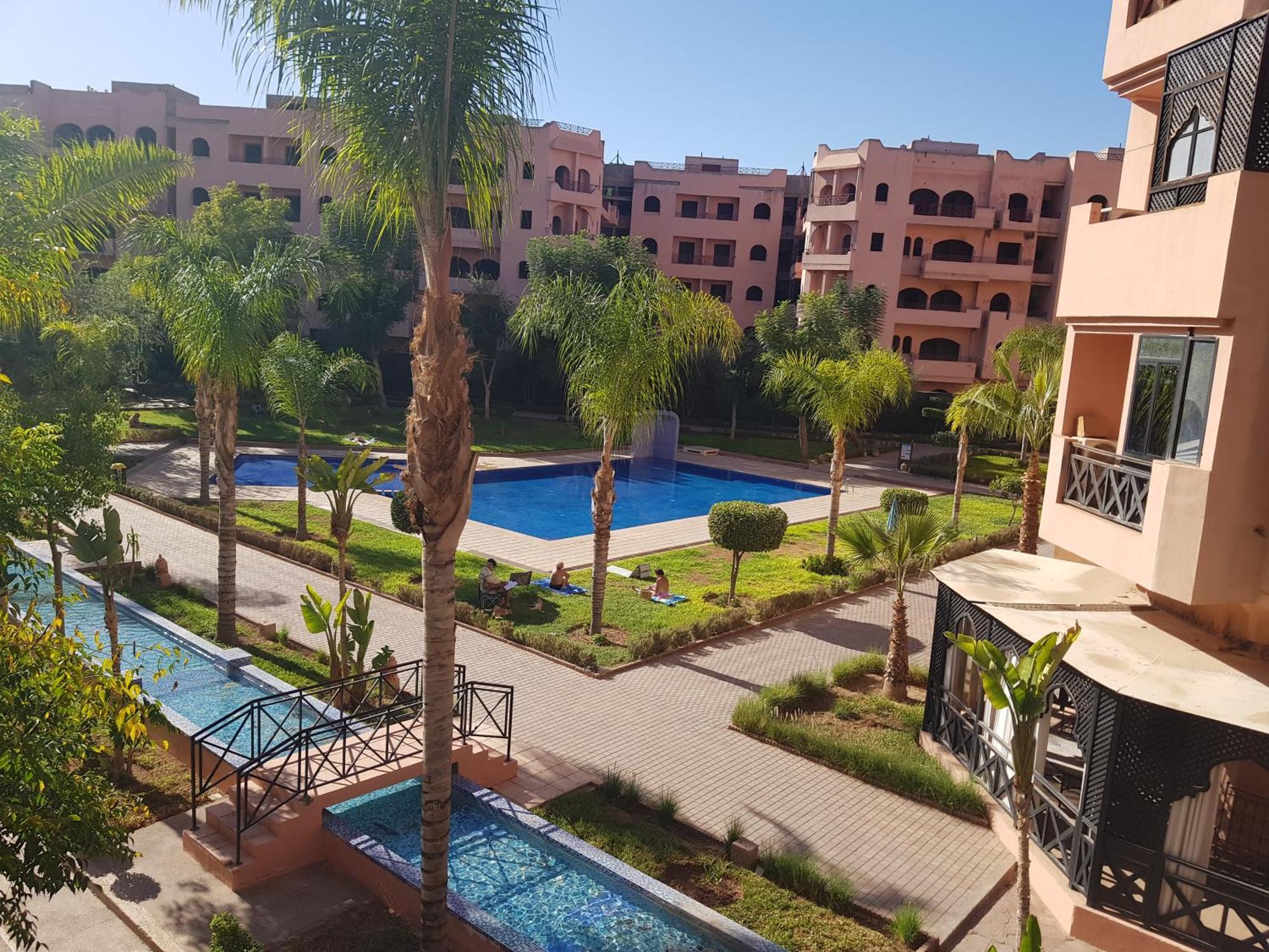 Un Moderne Chic Appartement Vue Sur Piscine Marrakesh Exteriör bild