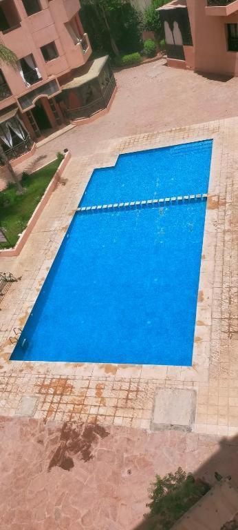 Un Moderne Chic Appartement Vue Sur Piscine Marrakesh Exteriör bild